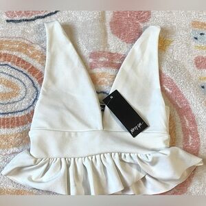 Stylewise’s White Peplum Crop Top